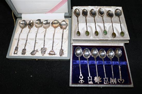 A set of six Japanese 950 standard coffee spoons and two other cased sets of Oriental silver coffee spoons